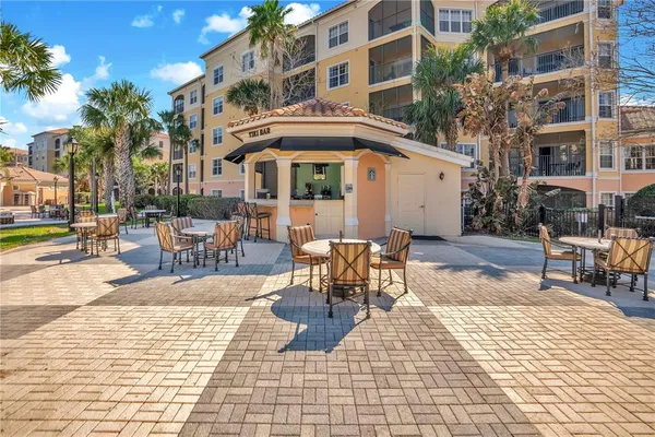 a view of a building with sitting area