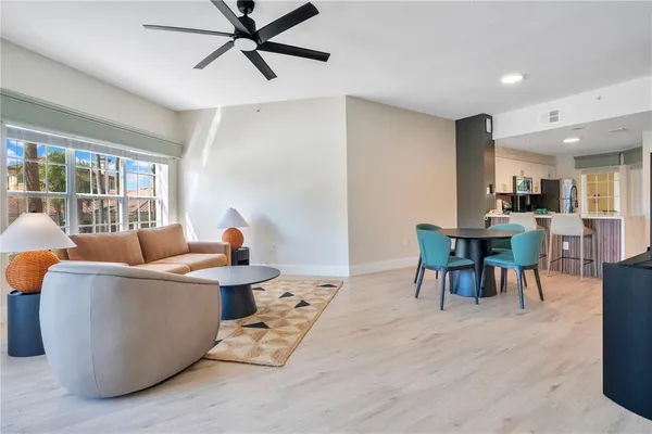 a living room with furniture and a window