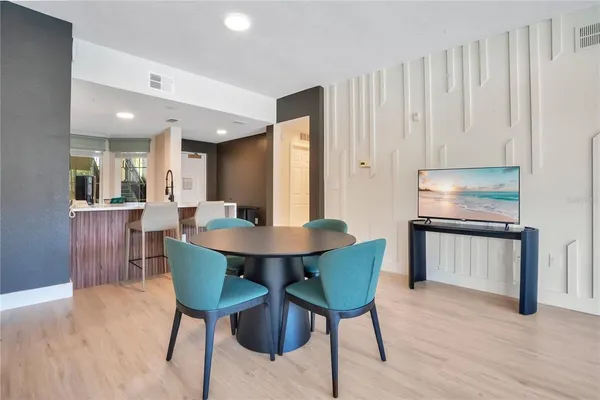 a view of a dining room with furniture