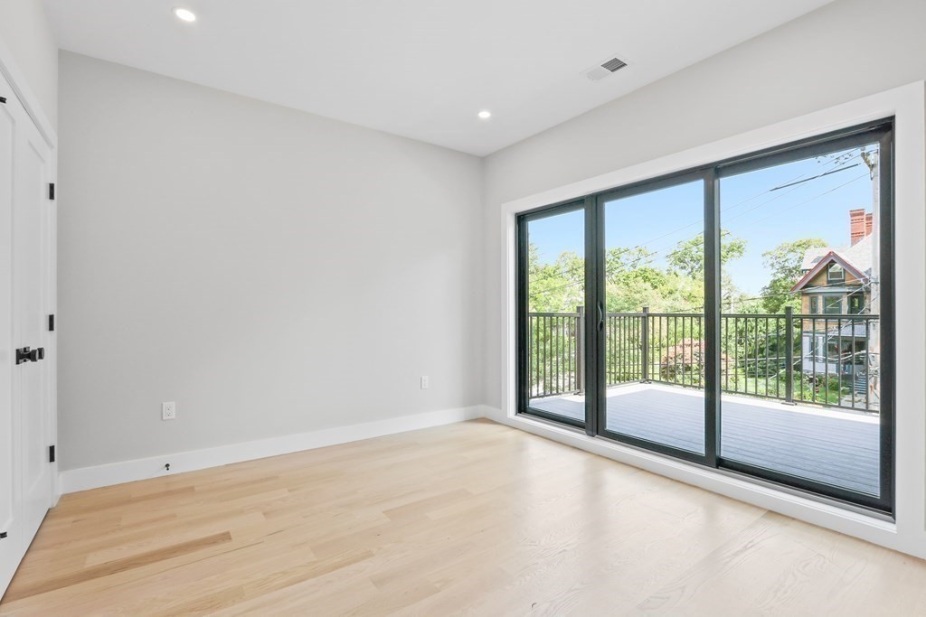 70 Washington Street, Unit 70 Newton, MA 02458 - Photo 16 of 25 a view of an empty room with a window