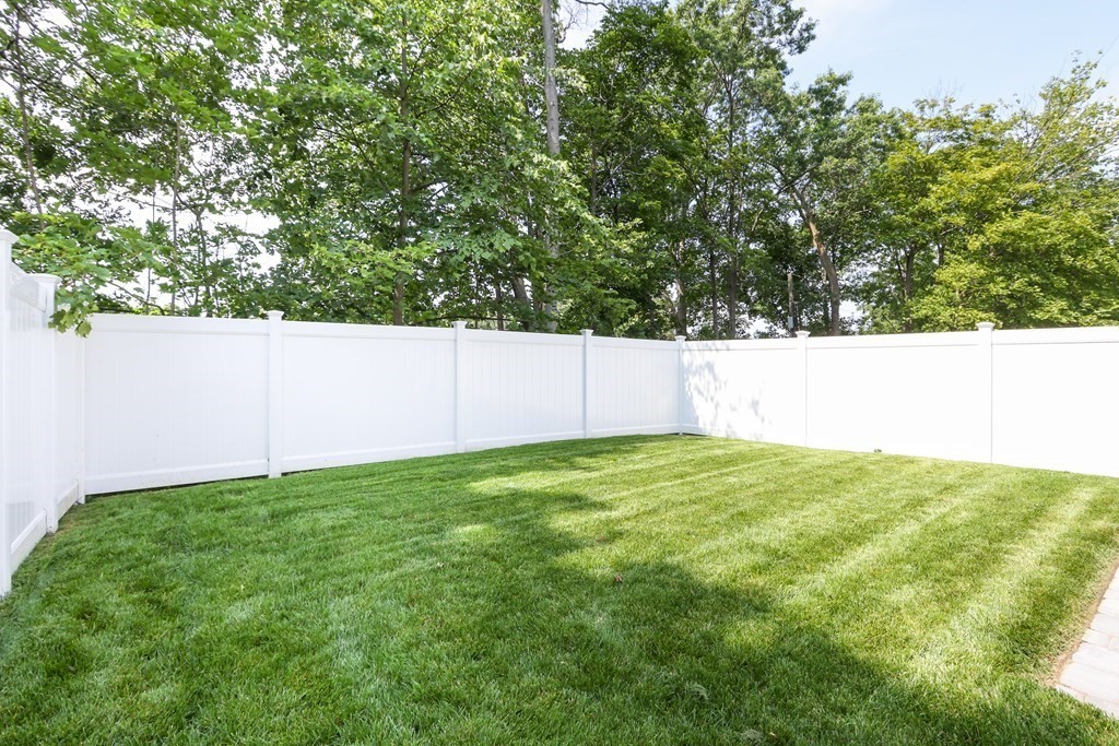70 Washington Street, Unit 70 Newton, MA 02458 - Photo 24 of 25 a view of a field of grass and trees