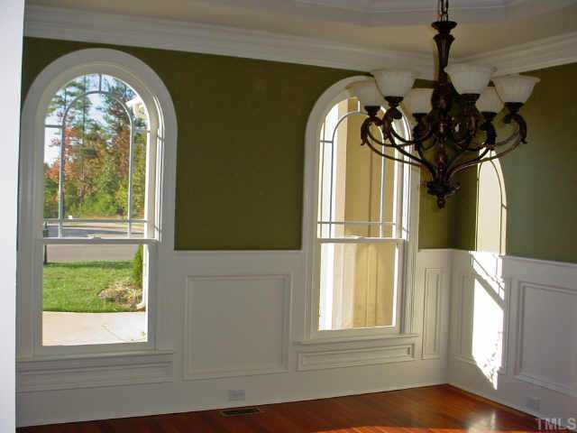 12408 Angel Road Raleigh, NC 27606 - Photo 4 of 12 a front view of a house with garden