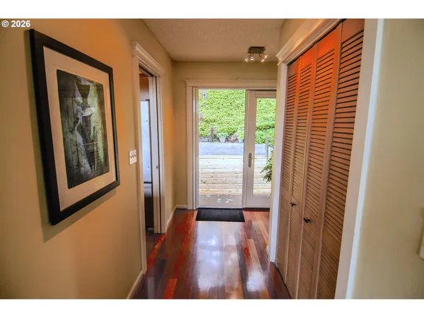 a view of a room that has a large window