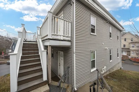 a view of a house with a deck