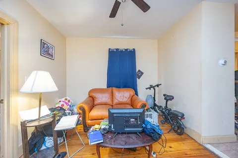 a room with furniture and a rug