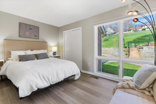 a kitchen with granite countertop white cabinets and appliances