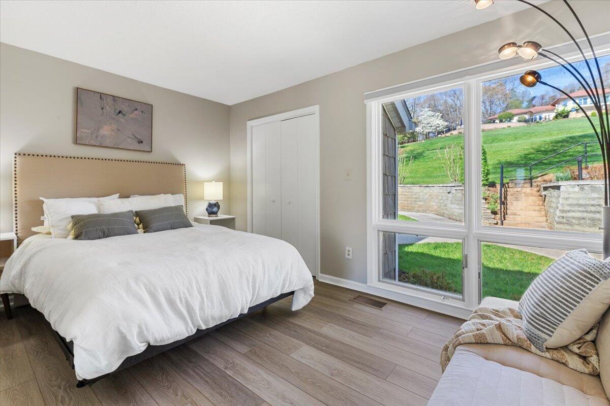1206 Nature Lane Union Hall, VA 24176 - Photo 12 of 106 a bedroom with a bed and a view of balcony