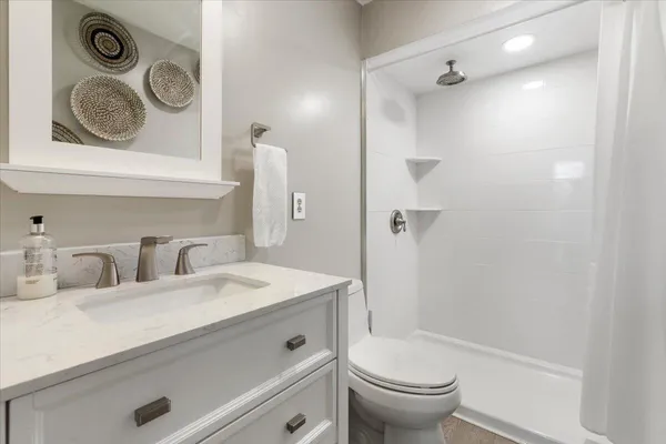 a view of a dining area with furniture and a large window