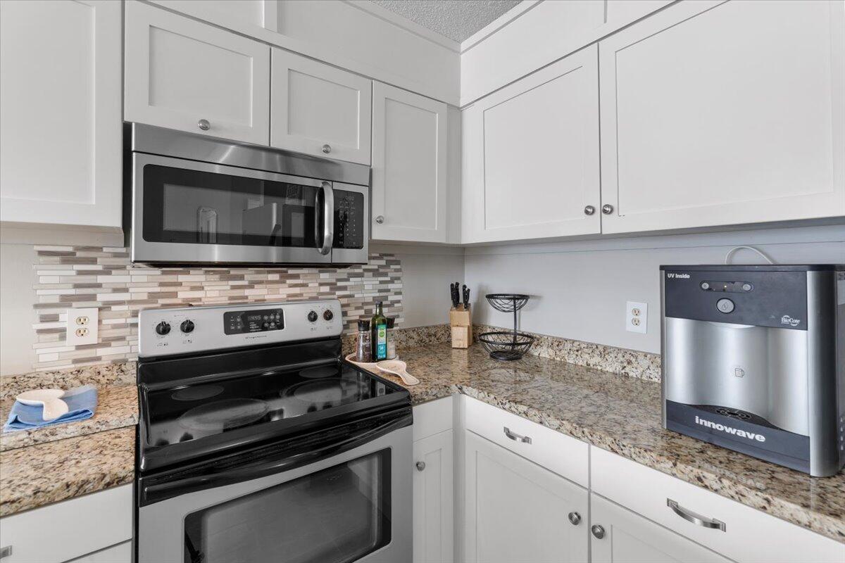 1206 Nature Lane Union Hall, VA 24176 - Photo 20 of 106 a kitchen with granite countertop white cabinets and appliances