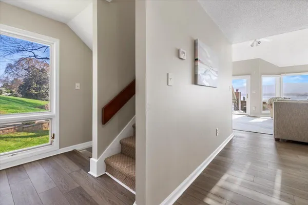 a view of livingroom with furniture and workspace