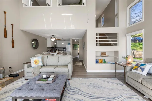 a view of a balcony with two chairs and a table