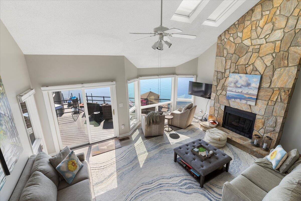 1206 Nature Lane Union Hall, VA 24176 - Photo 34 of 106 a living room with furniture a fireplace and a flat screen tv