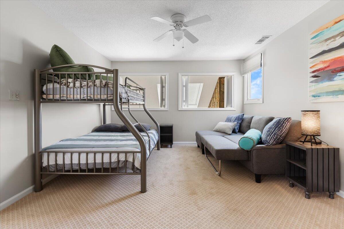 1206 Nature Lane Union Hall, VA 24176 - Photo 39 of 106 a living room with furniture and a ceiling fan