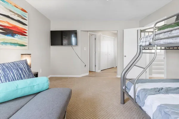 an aerial view of a house with a ocean view