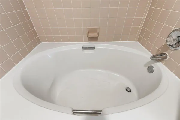 a view of a street with a building in the background