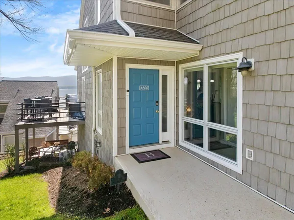 a view of entryway with wooden floor and a potted plant