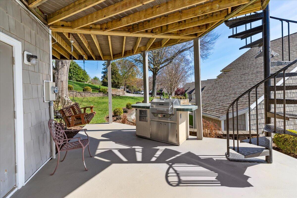 1206 Nature Lane Union Hall, VA 24176 - Photo 51 of 106 a building outdoor space with patio furniture and potted plants