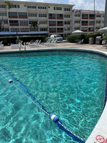 a table and chairs in the outdoor room