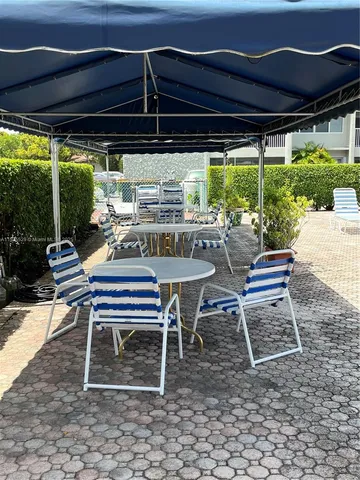 a view of outdoor space with seating