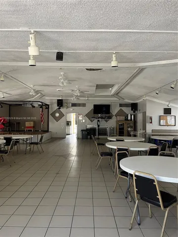 a backyard of a house with seating space