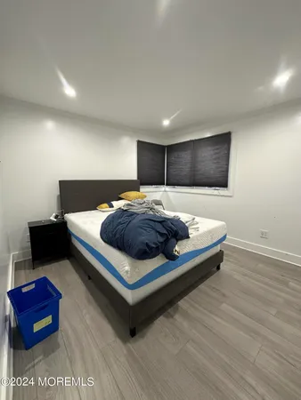 a large white bed in a white room