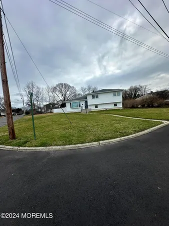 a view of open space with yard