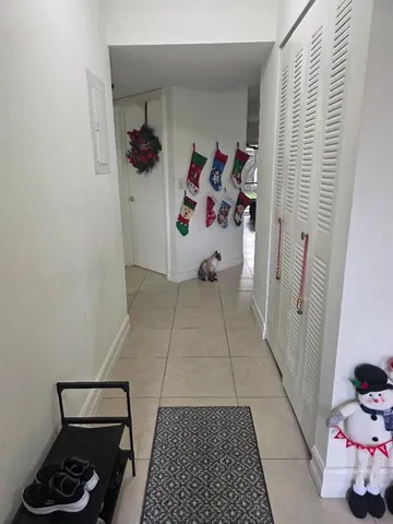 a white bath tub sitting next to a white toilet