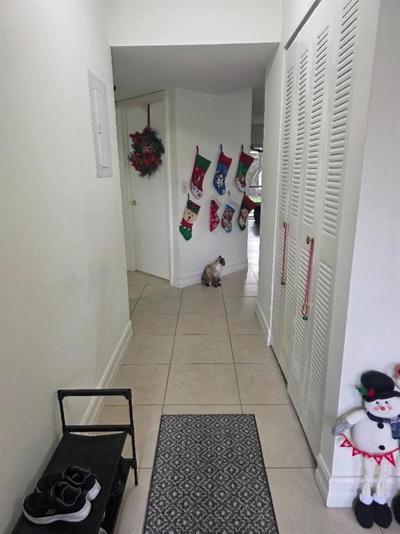 5583 Courtyard Drive, Unit 5583 Margate, FL 33063 - Photo 8 of 12 a white bath tub sitting next to a white toilet