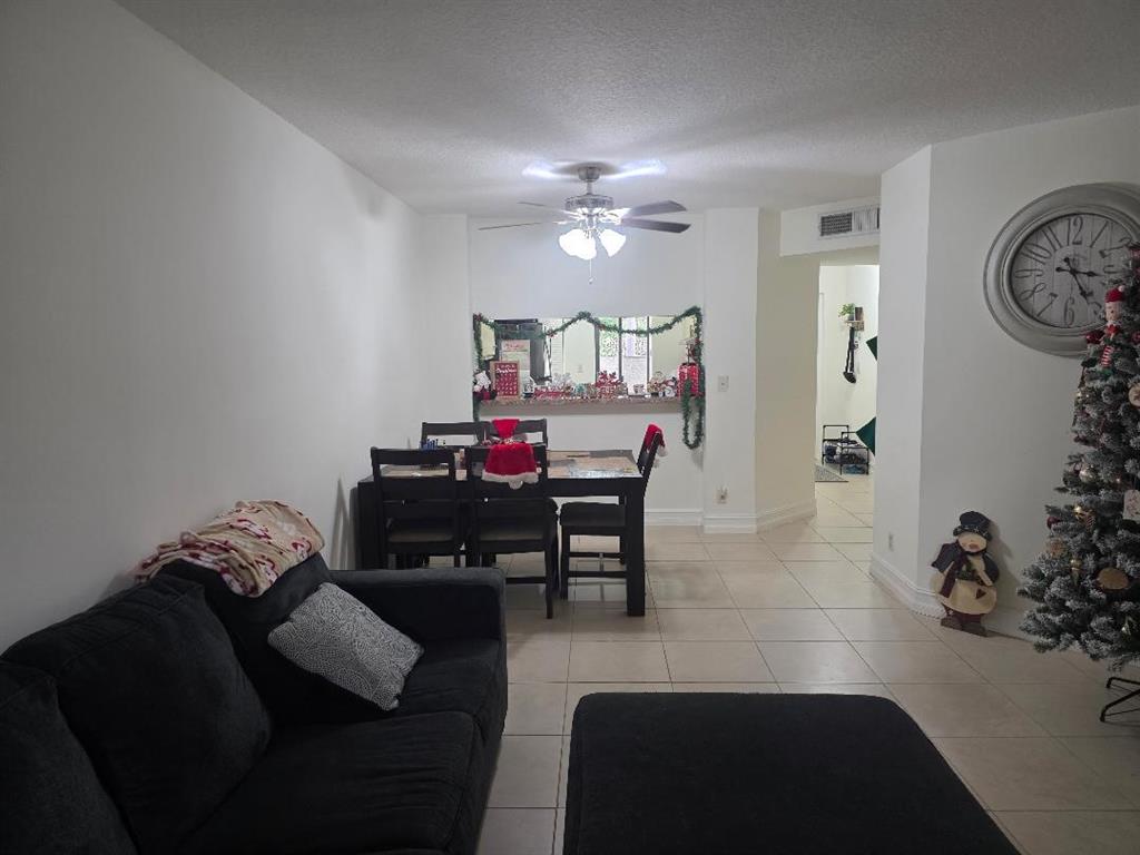 5583 Courtyard Drive, Unit 5583 Margate, FL 33063 - Photo 10 of 12 a view of a livingroom with furniture