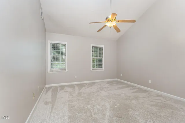 a backyard of a house with seating space