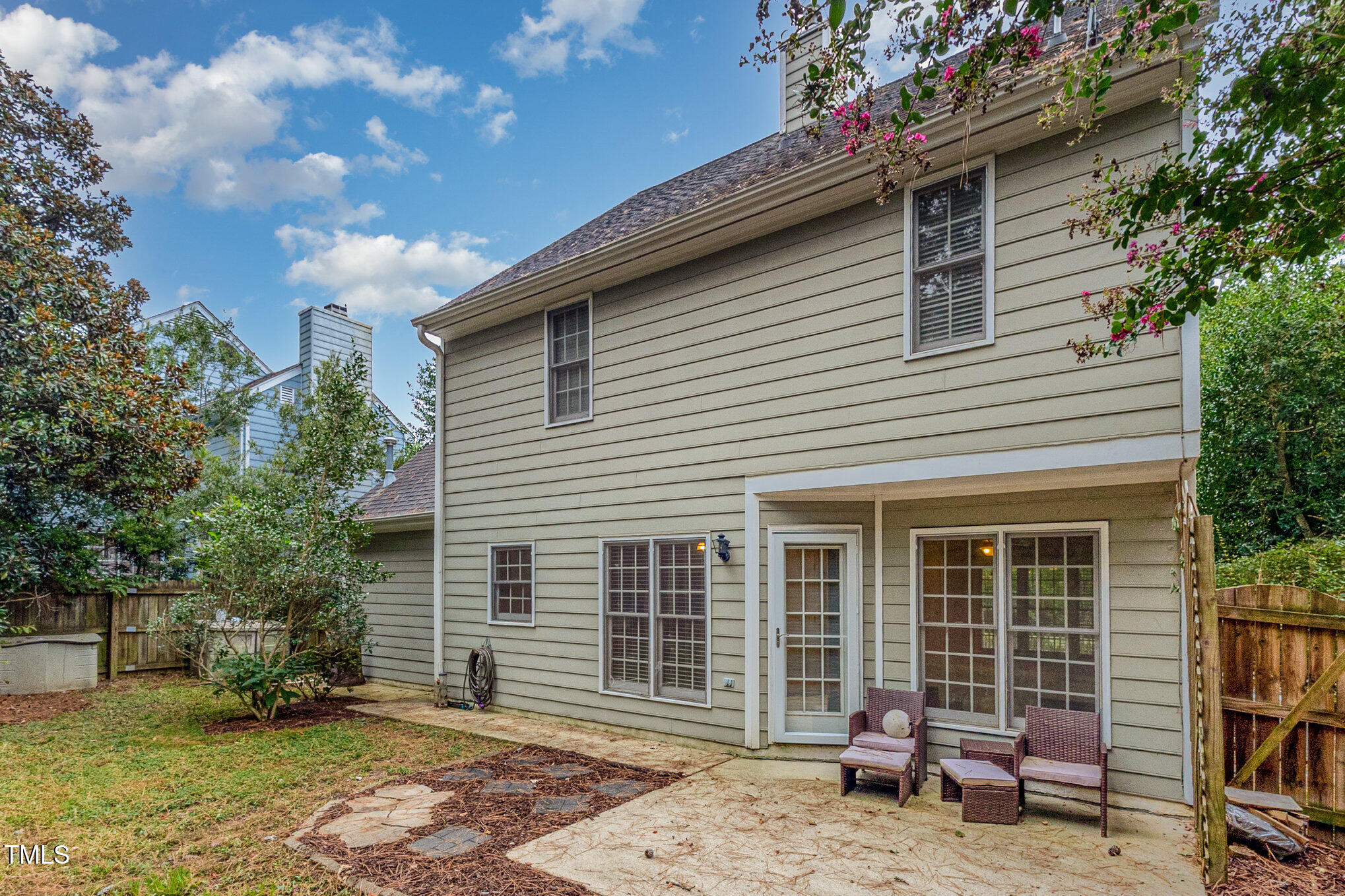 109 Gatepost Lane Cary, NC 27513 - Photo 31 of 37 a backyard of a house with seating space