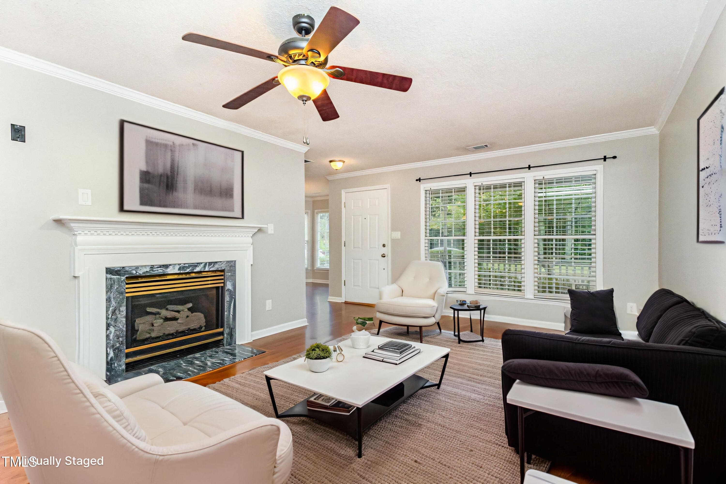 109 Gatepost Lane Cary, NC 27513 - Photo 4 of 37 a living room with furniture and a fireplace