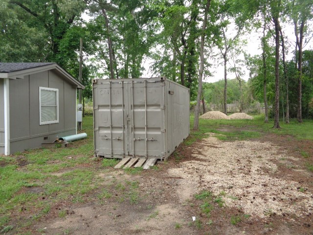 15120 Capitol Hill Road Montgomery, TX 77316 - Photo 16 of 17 a view of a backyard