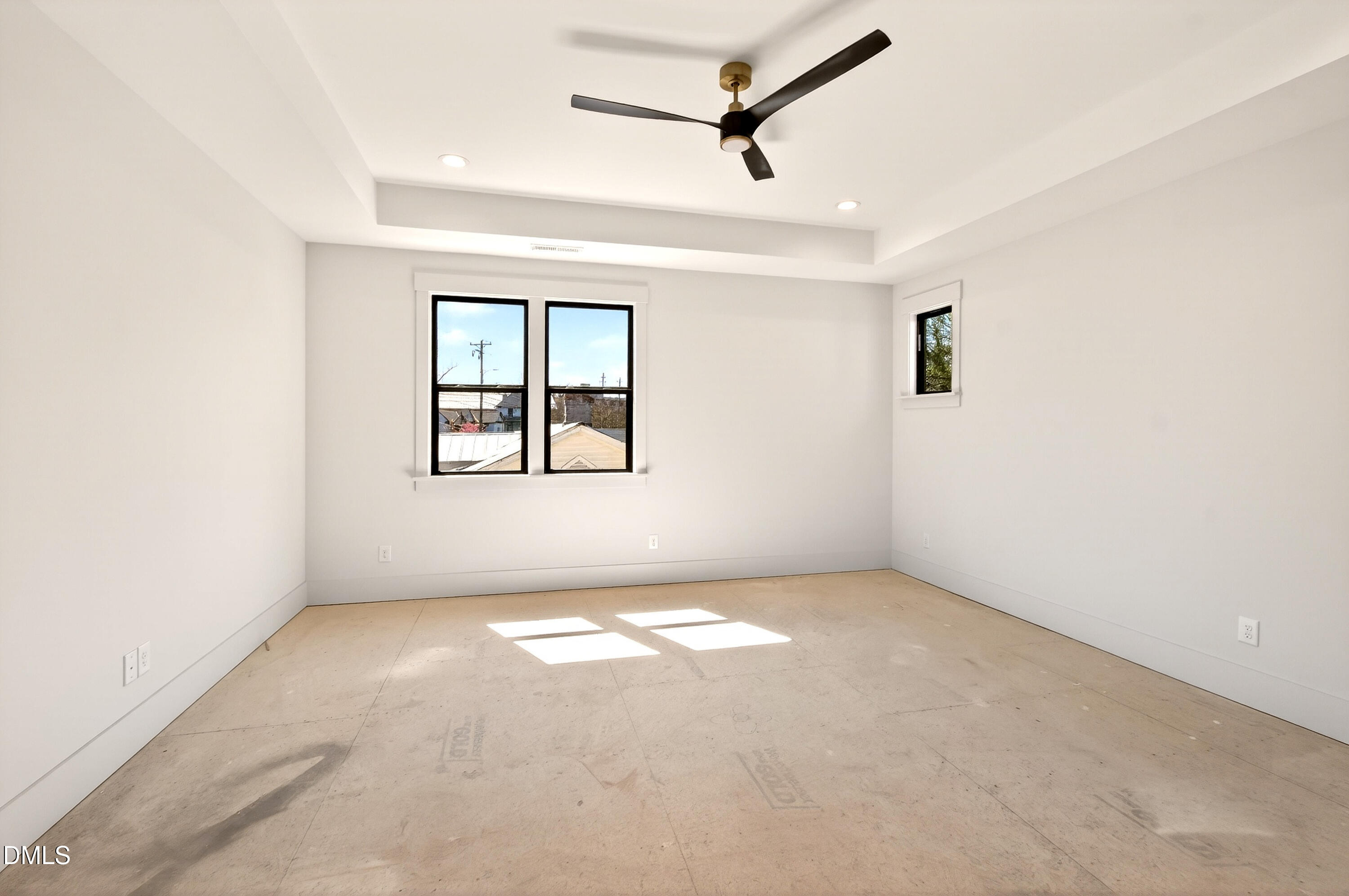 909 Oberlin Road Raleigh, NC 27605 - Photo 28 of 59 an empty room with windows and fan