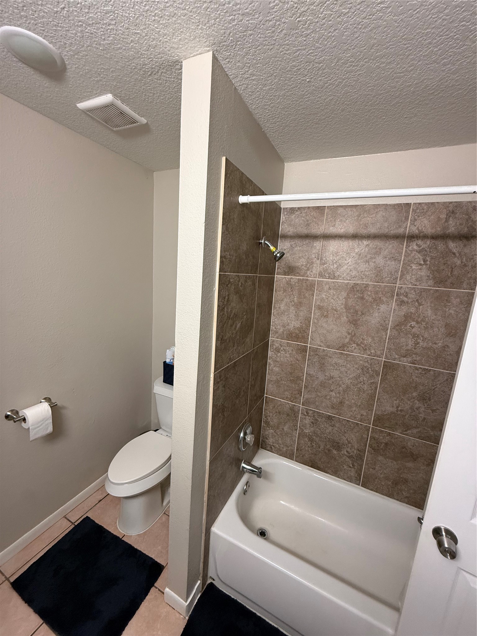 3103 Pine Dust Lane Spring, TX 77373 - Photo 12 of 29 a bathroom with a bathtub and a toilet