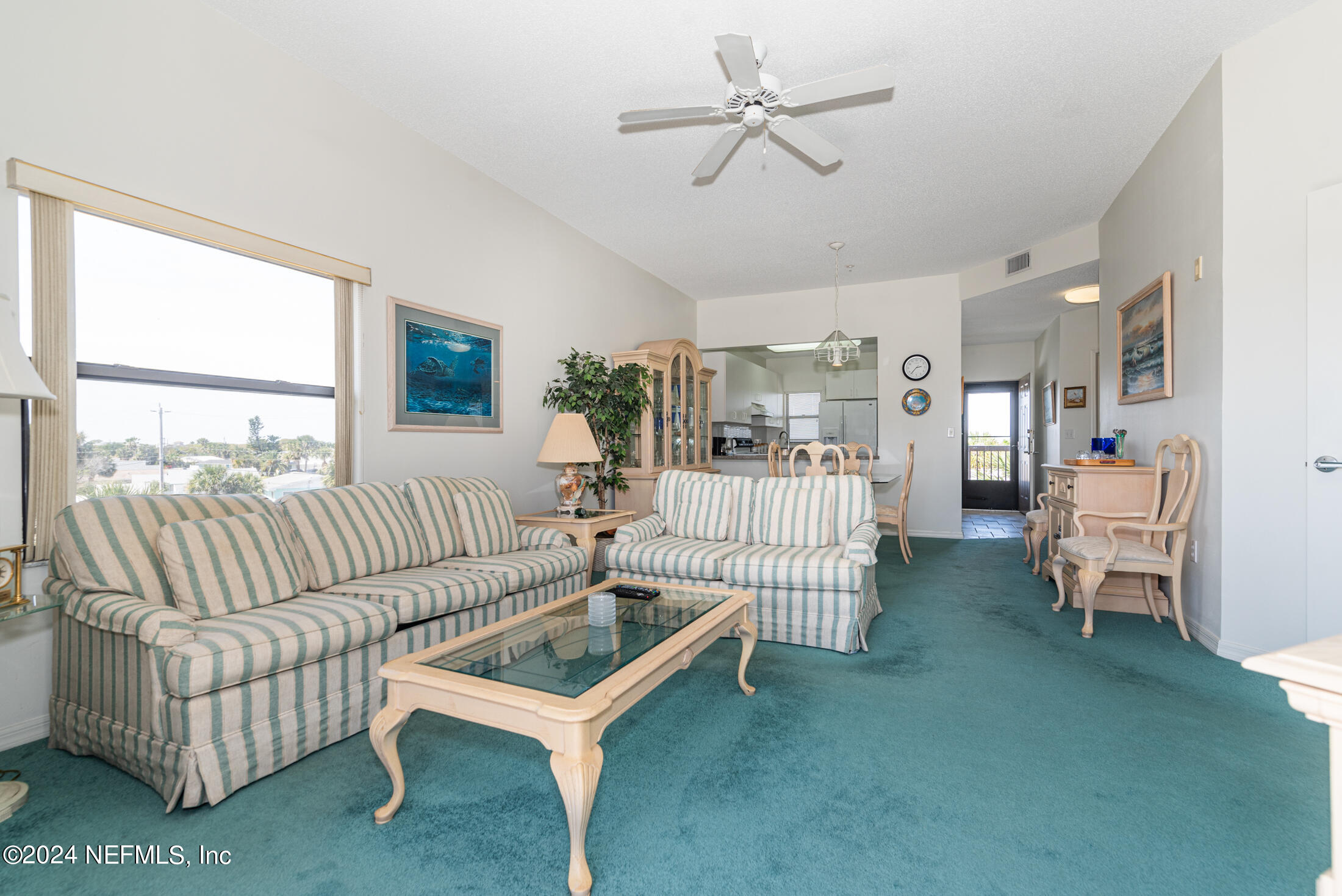 4250 A1A South, Unit Q31 (ELEVATOR) St. Augustine, FL 32080 - Photo 16 of 45 a living room with furniture and a table