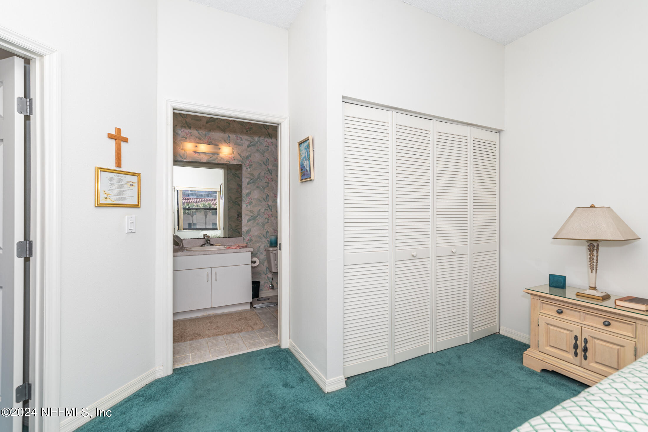 4250 A1A South, Unit Q31 (ELEVATOR) St. Augustine, FL 32080 - Photo 23 of 45 a room with a bed and a view of kitchen