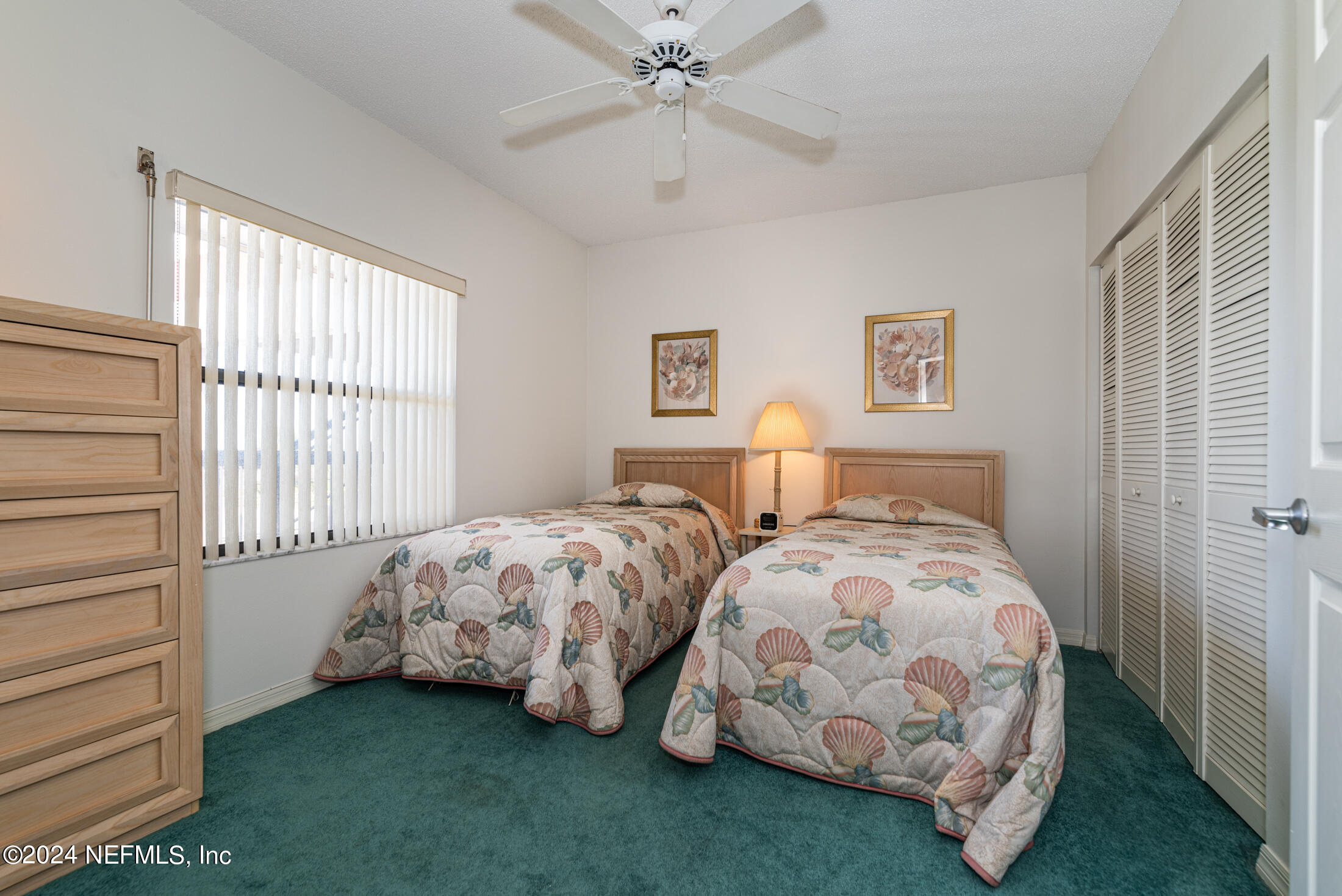 4250 A1A South, Unit Q31 (ELEVATOR) St. Augustine, FL 32080 - Photo 27 of 45 a bedroom with two beds and a window