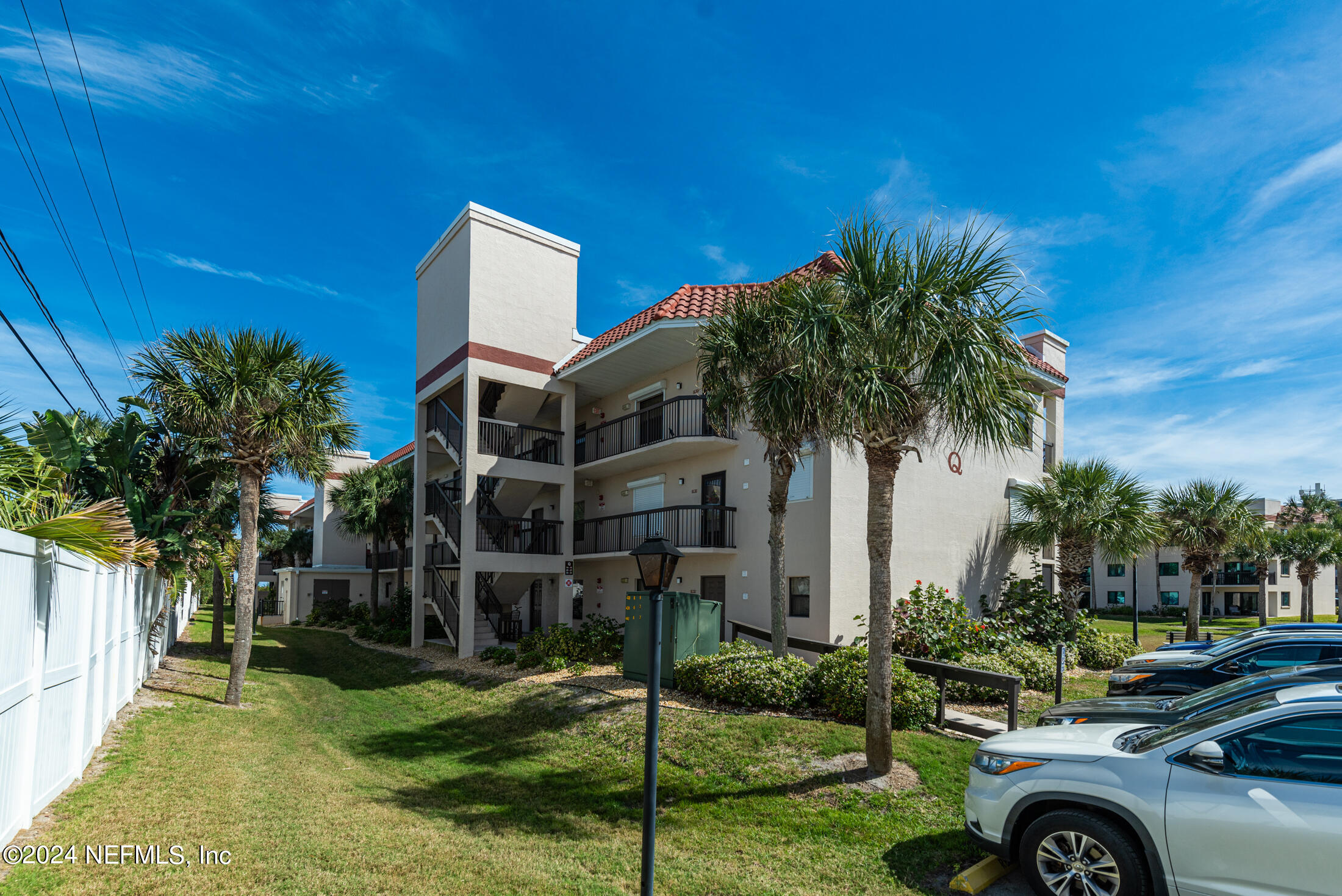 4250 A1A South, Unit Q31 (ELEVATOR) St. Augustine, FL 32080 - Photo 38 of 45 a front view of a house with garden
