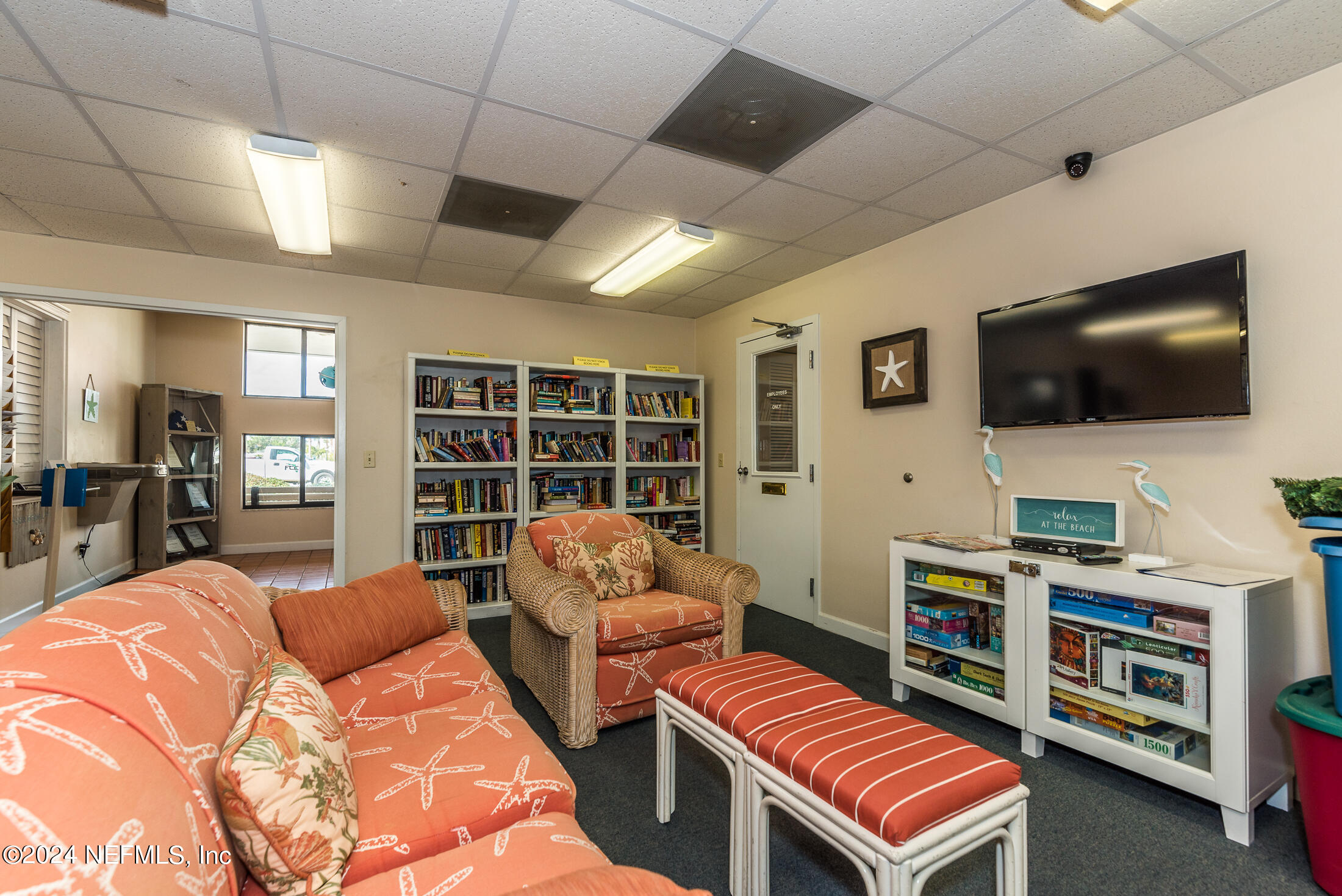 4250 A1A South, Unit Q31 (ELEVATOR) St. Augustine, FL 32080 - Photo 42 of 45 a bedroom with furniture and a flat screen tv