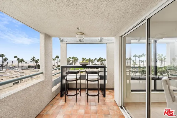 a view of a kitchen from a dining room