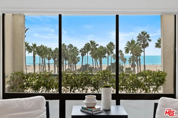 a view of a back yard from a balcony