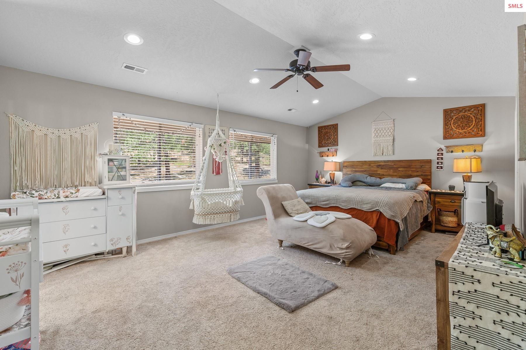 18341 West Highway 53 Rathdrum, ID 83858 - Photo 3 of 41 Located on the second floor is this large en-suite w vaulted ceilings, 2 large closets & full baths