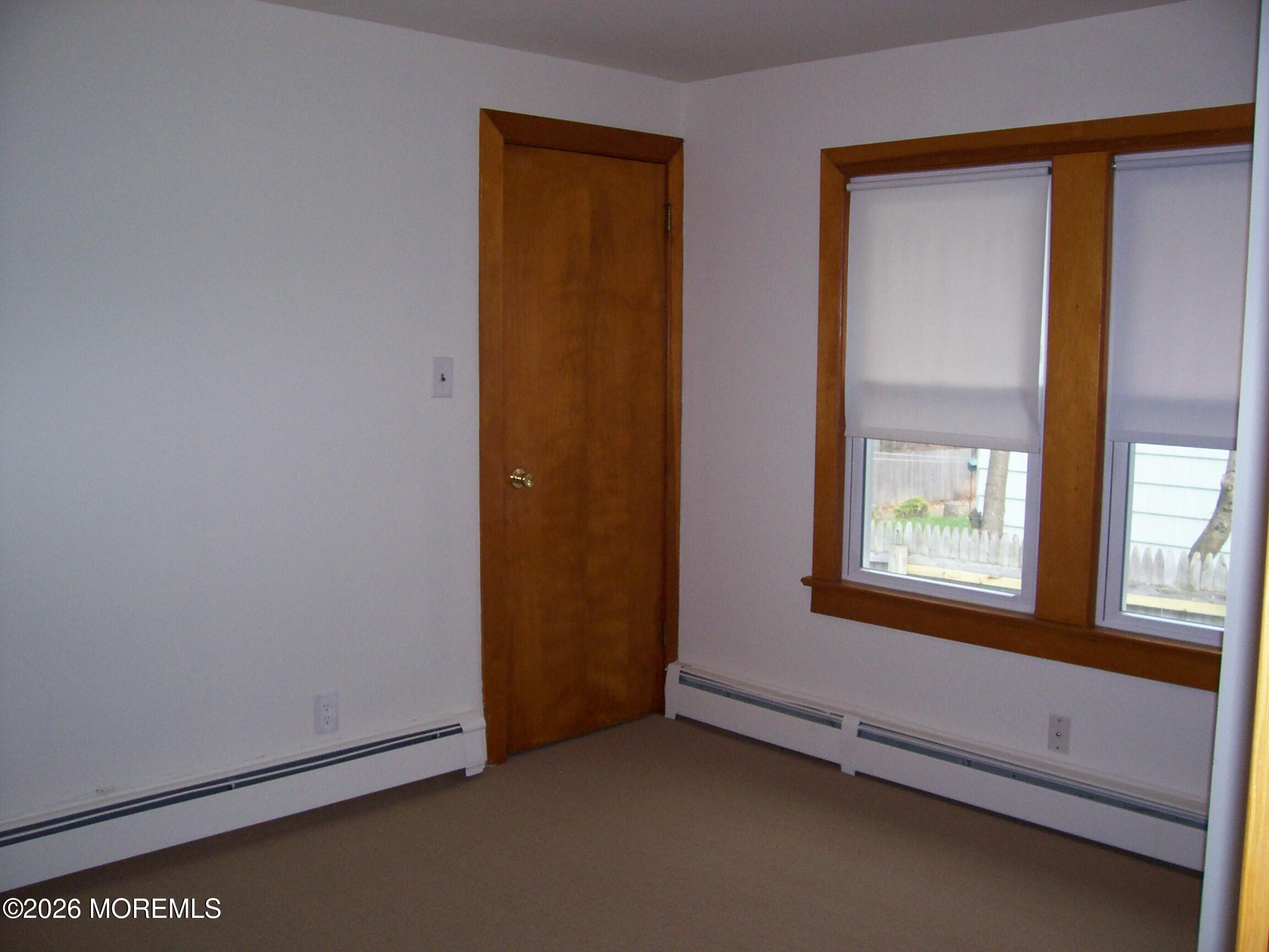 7 Houston Street Red Bank, NJ 07701 - Photo 23 of 38 an empty room with windows