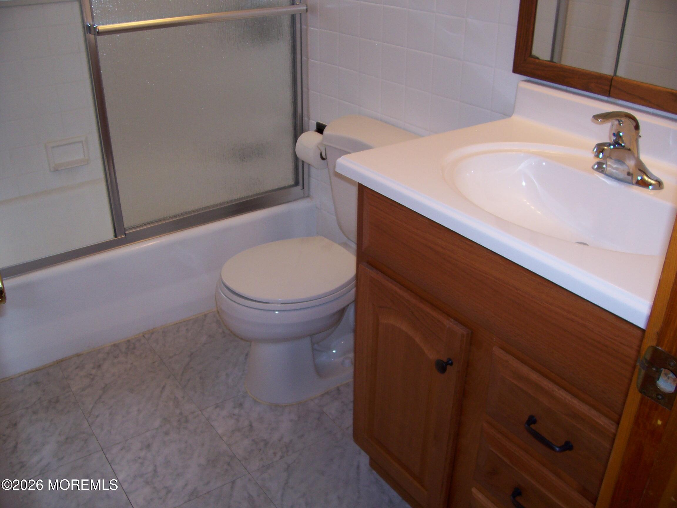 7 Houston Street Red Bank, NJ 07701 - Photo 26 of 38 a bathroom with a sink a toilet and shower