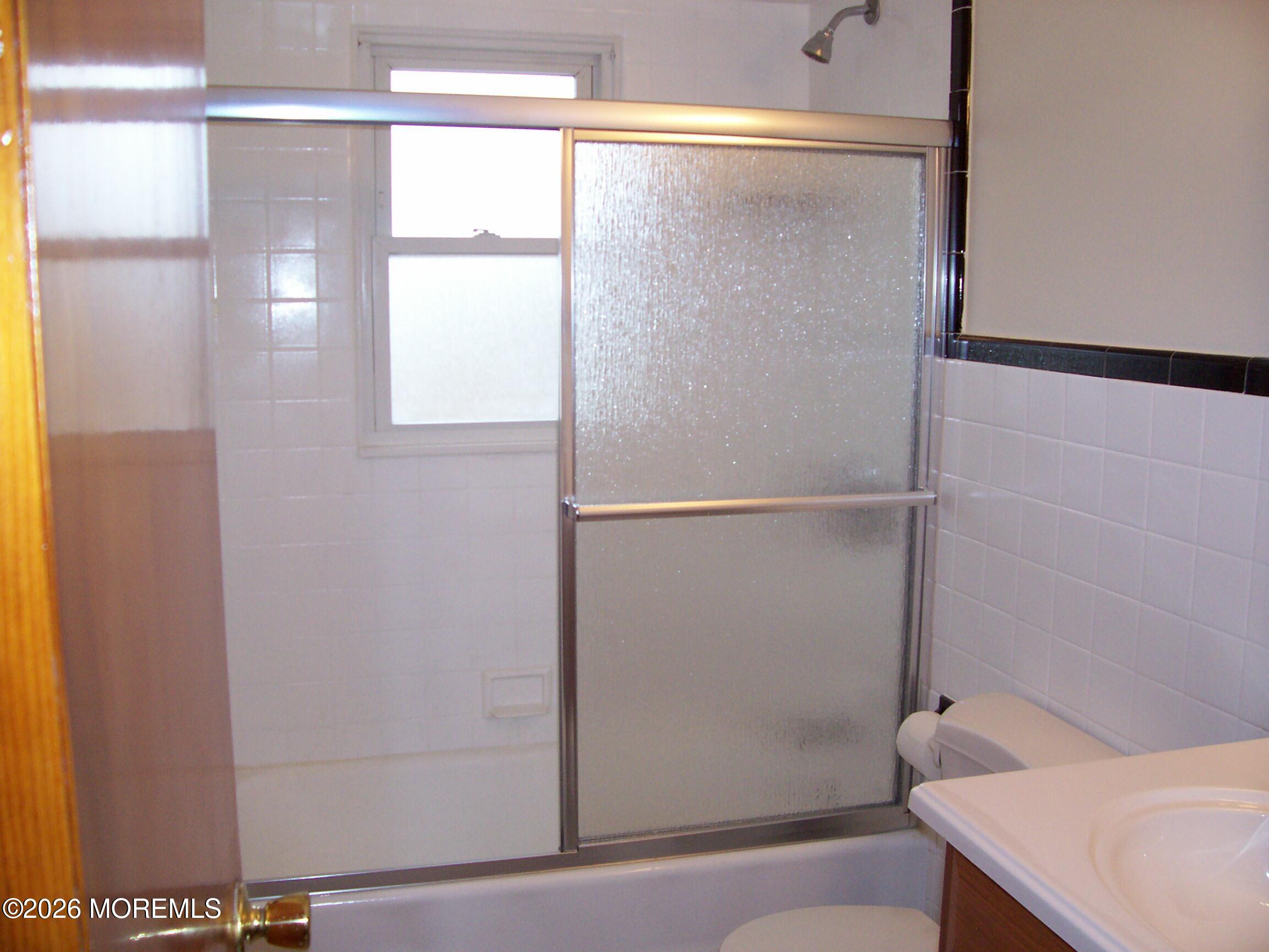 7 Houston Street Red Bank, NJ 07701 - Photo 27 of 38 a bathroom with a bathtub