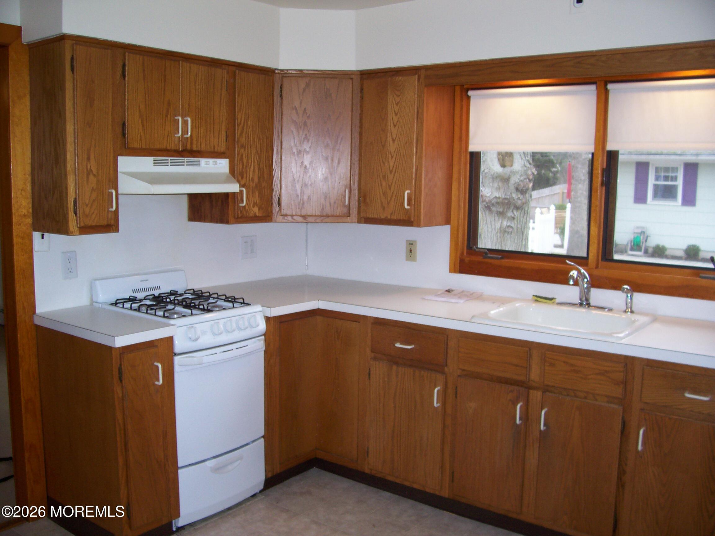 7 Houston Street Red Bank, NJ 07701 - Photo 29 of 38 a kitchen with a sink cabinets and window