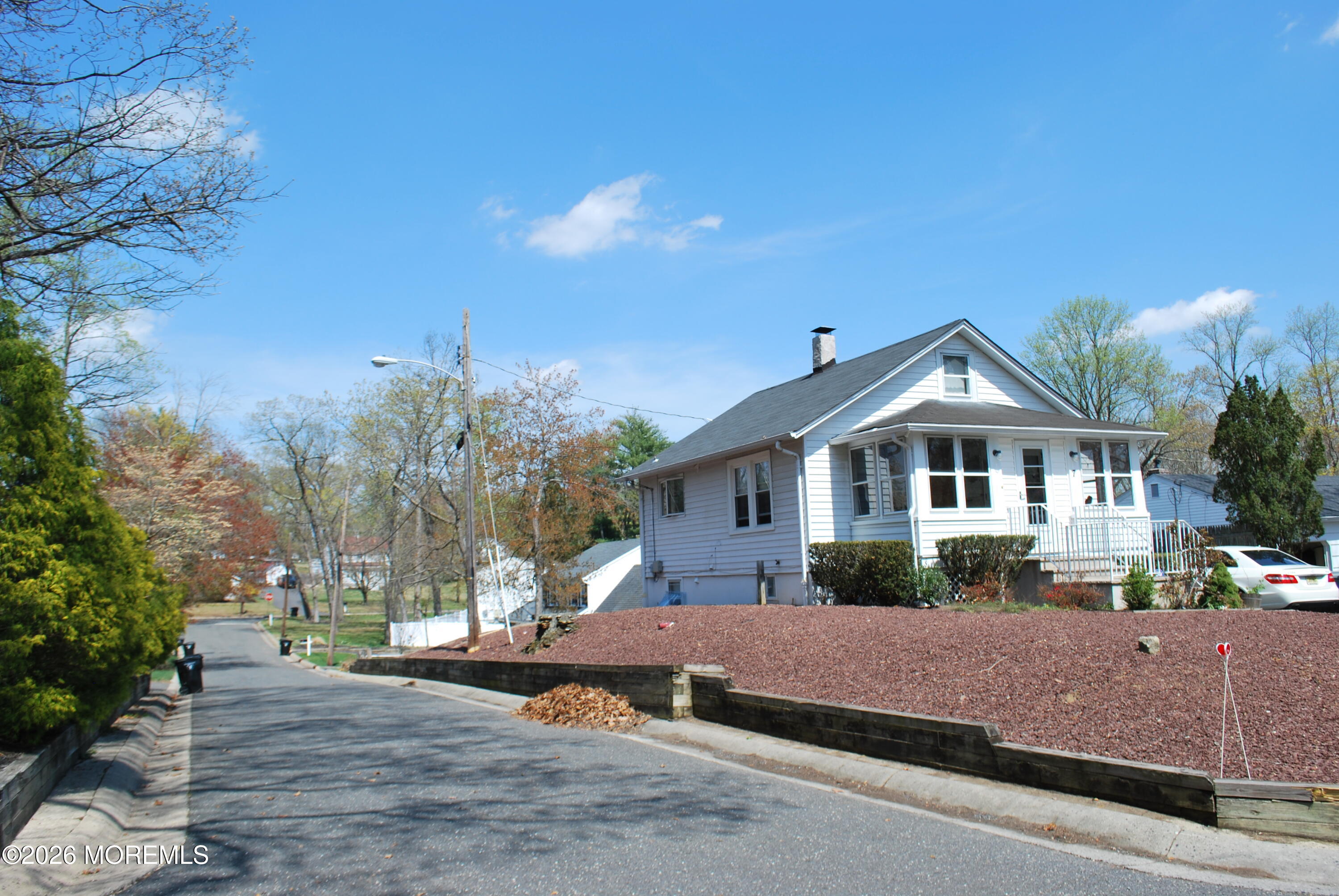 7 Houston Street Red Bank, NJ 07701 - Photo 5 of 38 a front view of a house with a yard