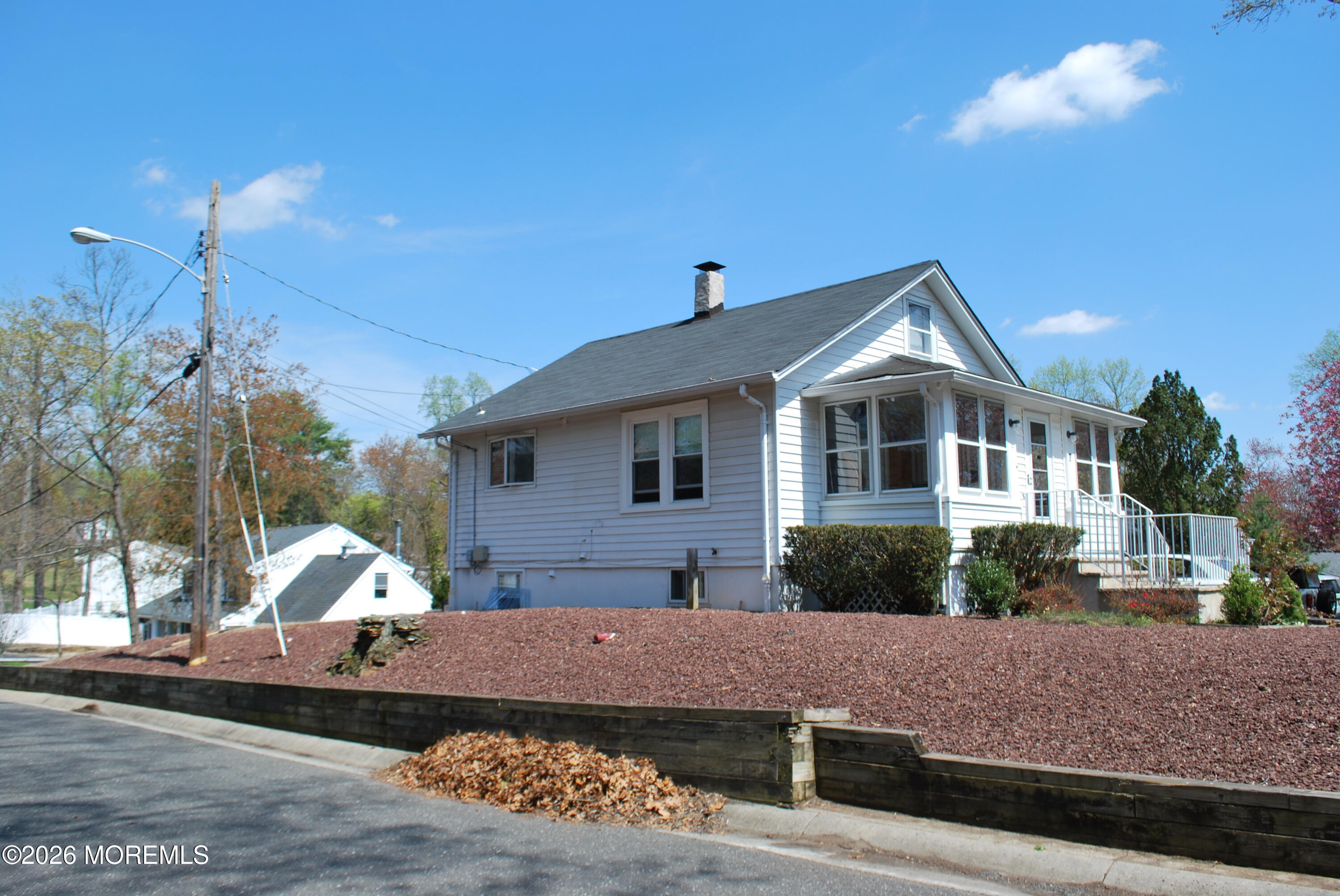 7 Houston Street Red Bank, NJ 07701 - Photo 7 of 38 a front view of a house with a yard and garage