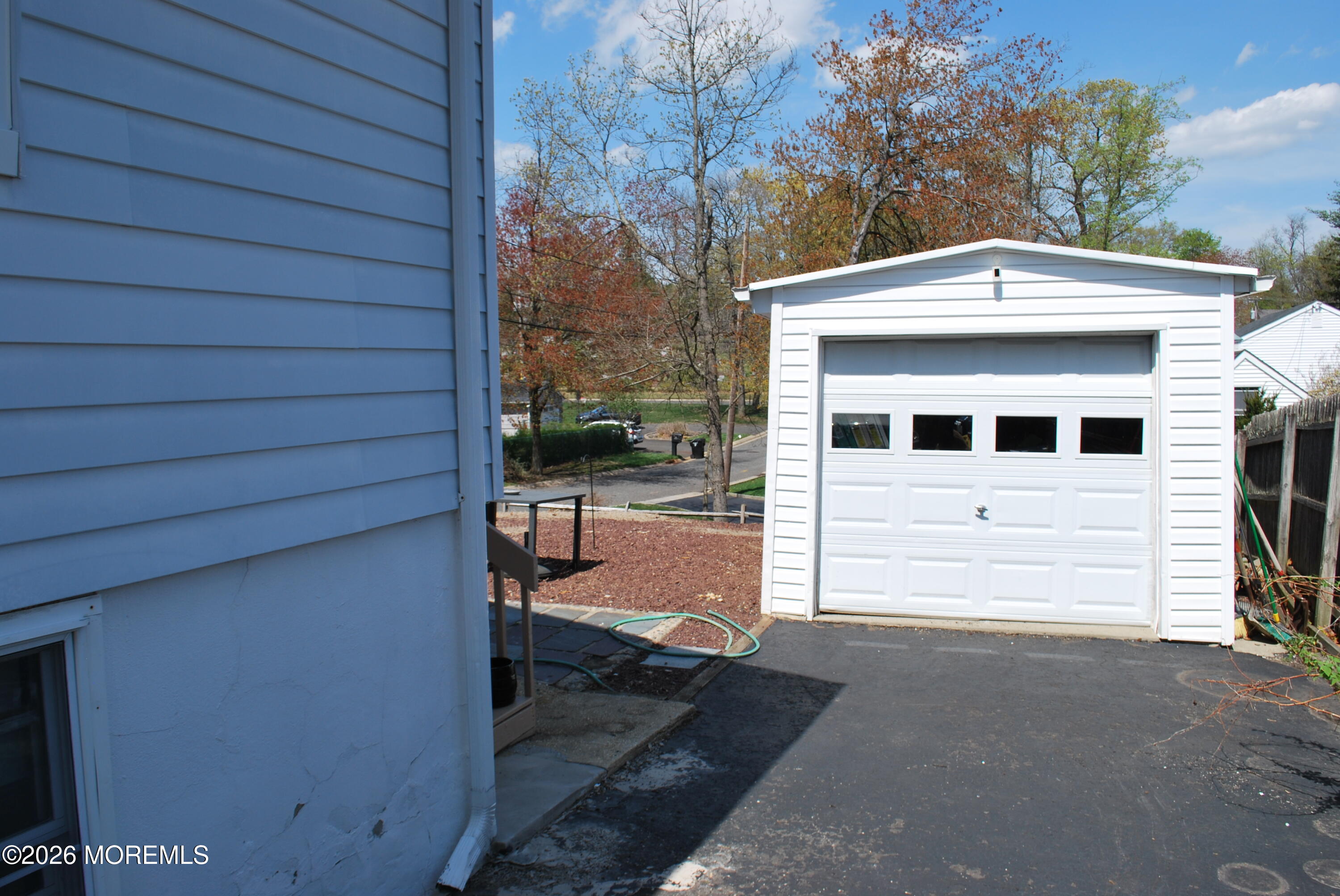 7 Houston Street Red Bank, NJ 07701 - Photo 9 of 38 a front view of a house with a garage